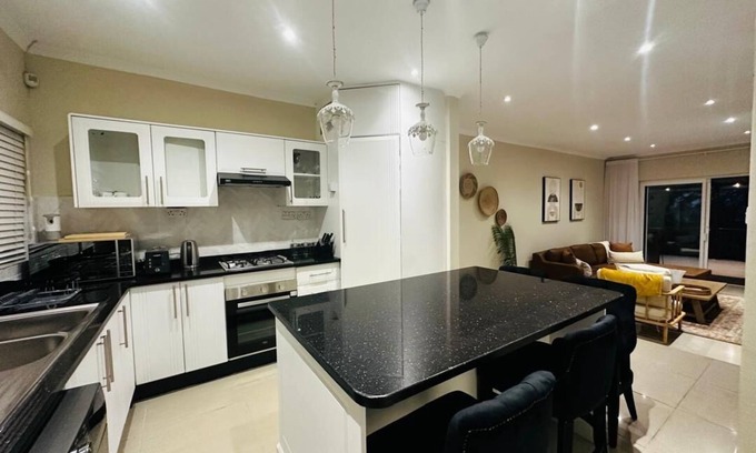 Harare Casa | Charming 2-bedroom house in peaceful Harare with a Pool ,AC, WiFi & fitness room