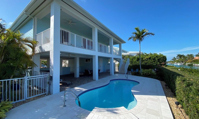 Coury Casa | Charming 3-bedroom house with pool and boat dock in Key Colony Beach