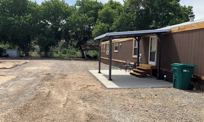 Navajo Dam Casa | Charming 3-bedroom home on San Juan River, access to river within feet of door.