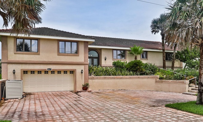 Beverly Beach Casa | Charming beachfront home with grill, patio, central AC, & washer/dryer