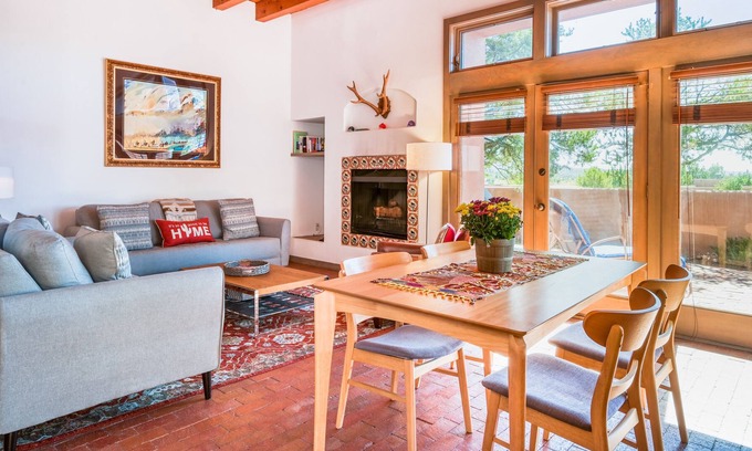 Nambe Pueblo Apartamento | Charming condo with fireplace, patio, grill, W/D, & pool - quiet location