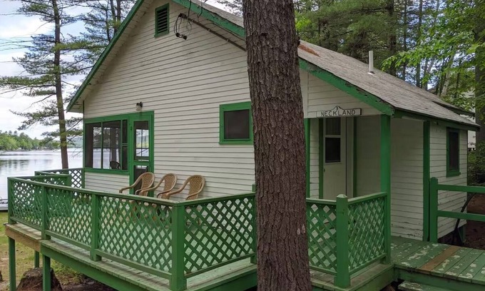 Raymond Cabaña | Charming Getaway with Screened Porch, Deck, and Scenic Lake Views