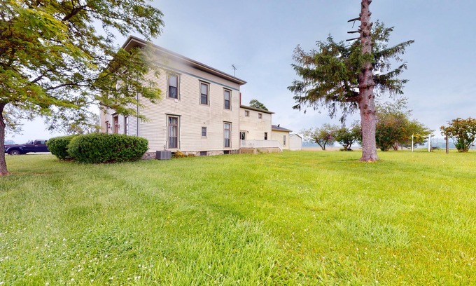 Penn Yan Casa | Charming home with firepit, skiing nearby, full kitchen, central AC, & W/D