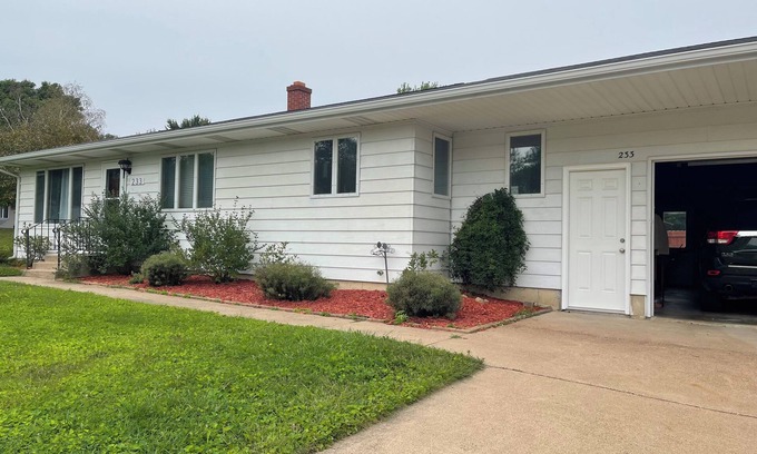 Cadott Casa | Charming pet friendly cozy hideaway with private backyard.
