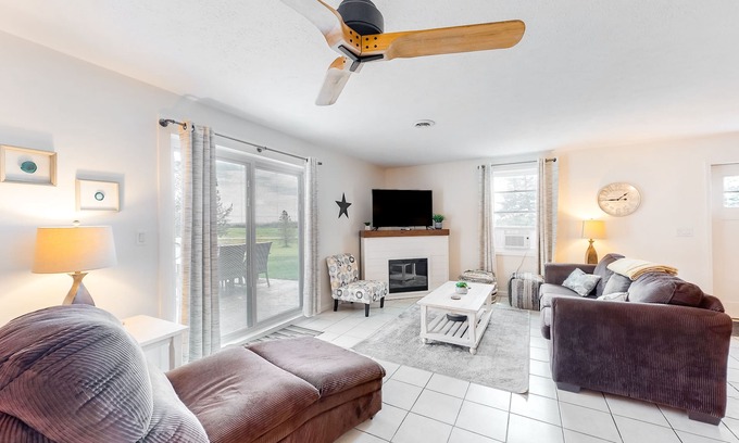 Branchport Casa | Charming retreat with private hot tub, fireplace, & furnished patio