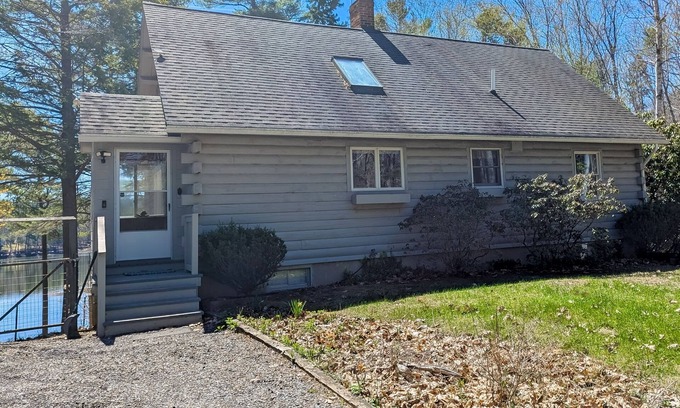 Wiscasset Casa | Charming riverfront home with cozy interiors, dock, and scenic deck views