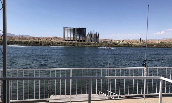 Bullhead City Casa | Charming Riverfront Vacation Getaway with Private Dock, Sleeps 12.