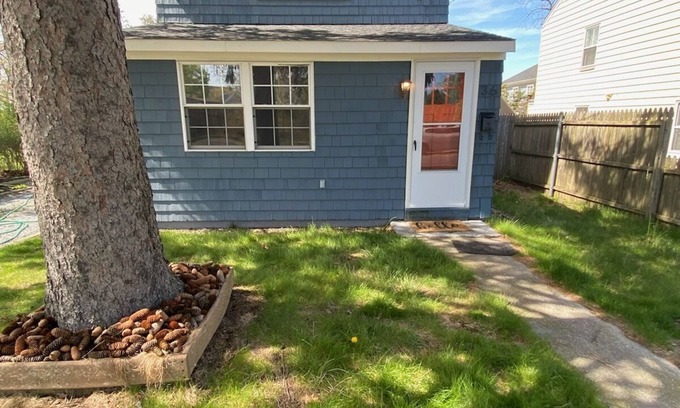 Riverhead Casa | Charming Riverhead home with large outdoor patio & backyard firepit