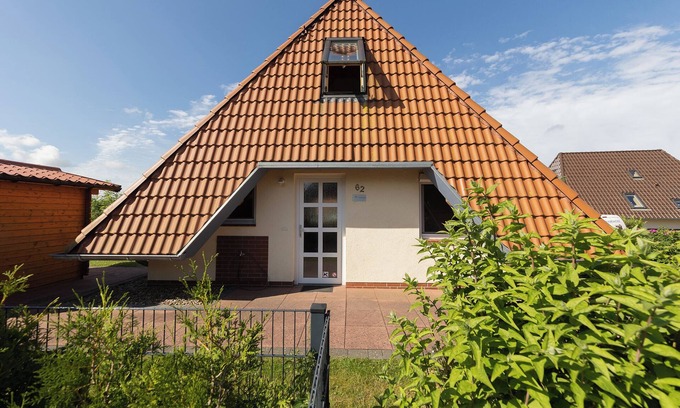 Dorumer Neufeld Casa | Charming vacation home Mellumplate 62 with wood-burning stove.