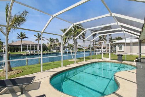 Punta Gorda Casa | Chic & modern canal-front retreat with private pool - Azure Tides