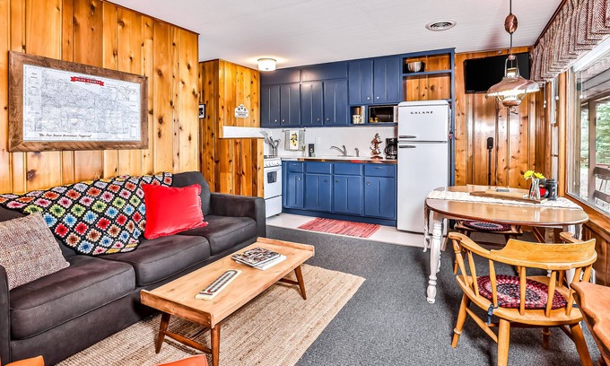 Presque Isle Casa | Classic, lakefront suite at a vintage resort with communal dock, firepit & views