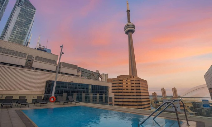 Toronto Entertainment District Hotel | CN Tower View Stays - Parking/Pool/Downtown