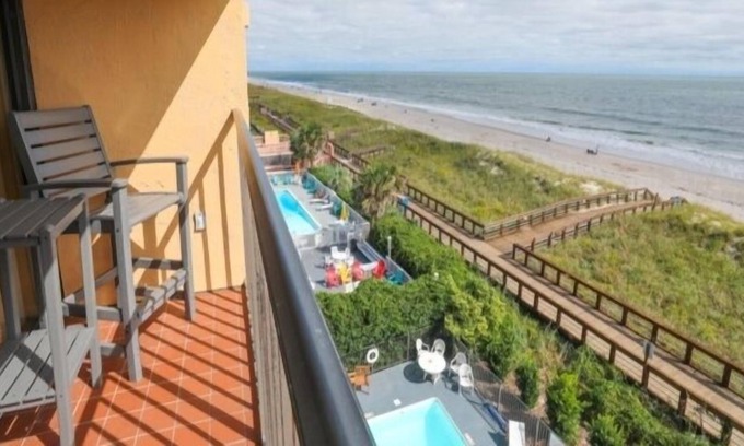 Carolina Beach Condominio | Coastal Cabana - Enjoy The Gorgeous Oceanfront Sunrise From Your 4th Floor Balcony. Walk To The Carolina Beach Boardwalk 2 Bedroom Condo by Redawning