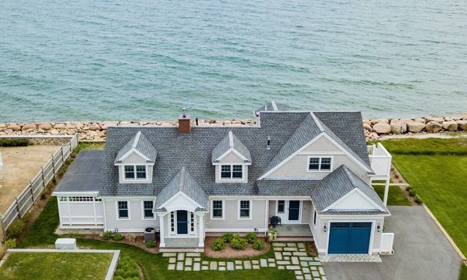 East Falmouth Casa | Coastal chic meets French Provençal in this newly renovated oceanfront home.