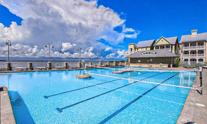 Sunset Island Casa | Coastal retreat with beach and shared pool - balconies, AC, & W/D