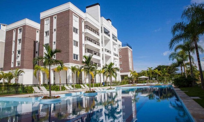 Abraao Apartamento | Cobertura Beira Mar com Piscinas, Academia, Quadra de Tênis e 4 vagas de garagem