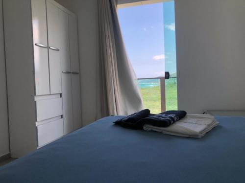 Morro das Pedras Apartamento | Cobertura com churrasqueira frente mar!