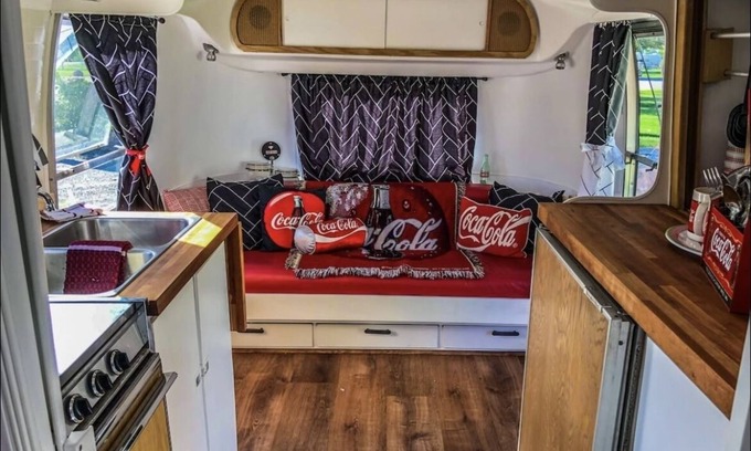 Irwin Casa | Coca-Cola themed 1968 Airstream. Walk to the Snake River.