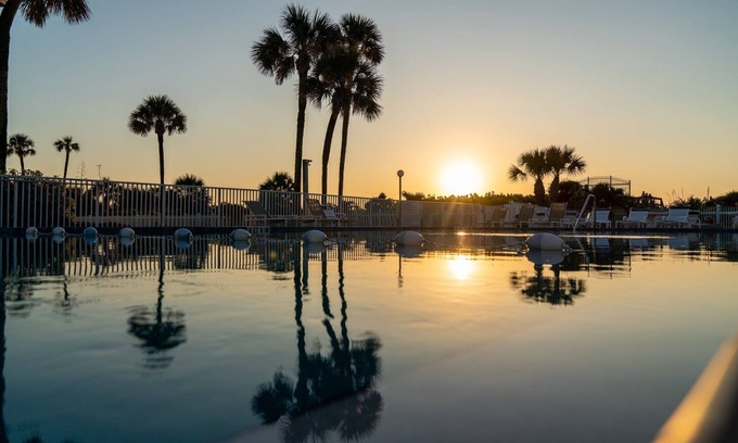 Port Canaveral Condominio | Cocoa Beach Towers by Happy Palm Stays