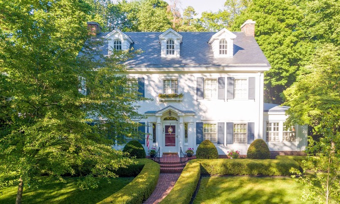 Sidney Casa | Colonial Home on Wooded Lot