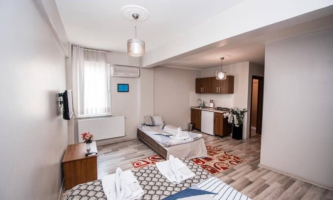 Emin Sinan Apartamento | Habitación Triple Confort con Kichenette