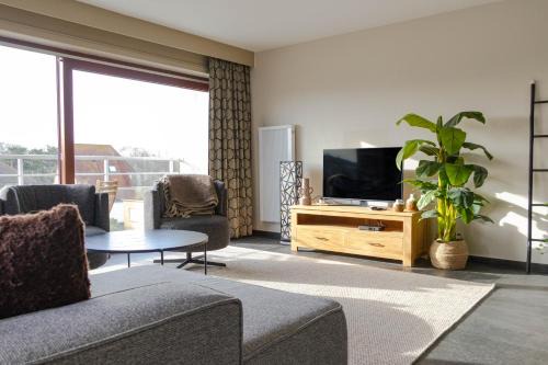 Oostduinkerke-Bad Apartamento | Comfortabel vakantie appartement aan zee - De Zandloper