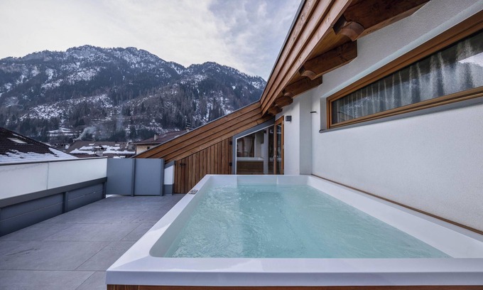 Predazzo Apartamento | Cómodo apartamento "Vacanze Arcobaleno - Azzurro" con vistas a la montaña
