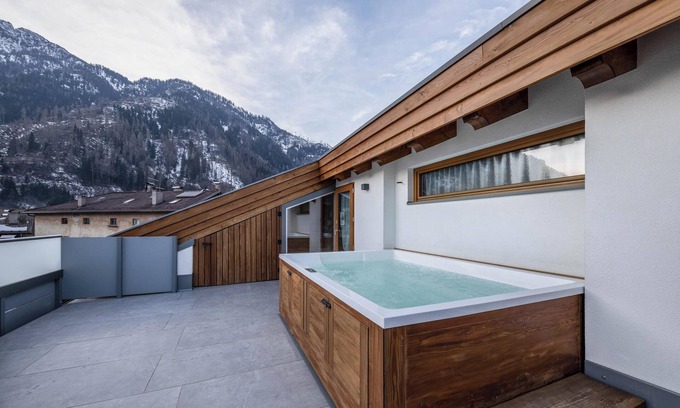Predazzo Apartamento | Cómodo apartamento "Vacanze Arcobaleno - Blu" con vistas a la montaña
