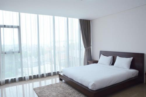 Pancoran Apartamento | Comfy 1BR L'Avenue Apartment By Travelio