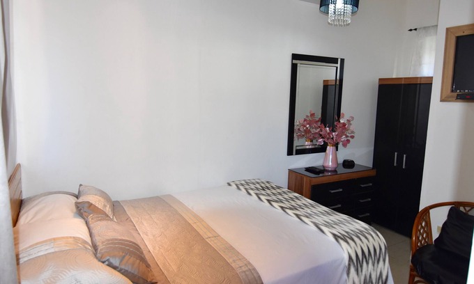 Mammee Bay Estates Apartamento | Cómodas habitaciones con piscina, además de wifi gratuito, cabaña de spa, barbacoa, seguridad las 24 horas
