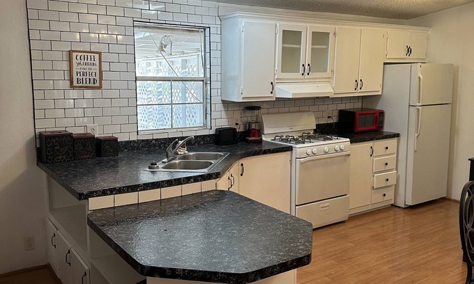 Kirtland Casa | Comfy country home for the whole family with private patio and BBQ.