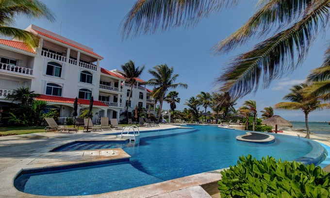 Puerto Morelos Condominio | Condo #322 at Caribbean Reef Villas - OceanFront, huge pool for families/couples