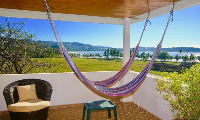 Sámara Condominio | 'Mejor Condo en Samara' Pasos a la arena. Exquisita playa + vistas al mar! No busque más
