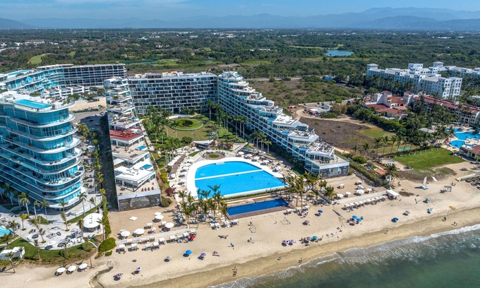 Flamingos Condominio | Condo Aria Ocean 1012 by Kivoya