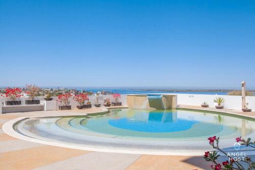 Colina del Sol Apartamento | Condos with Spectacular Views & Pool Onsite