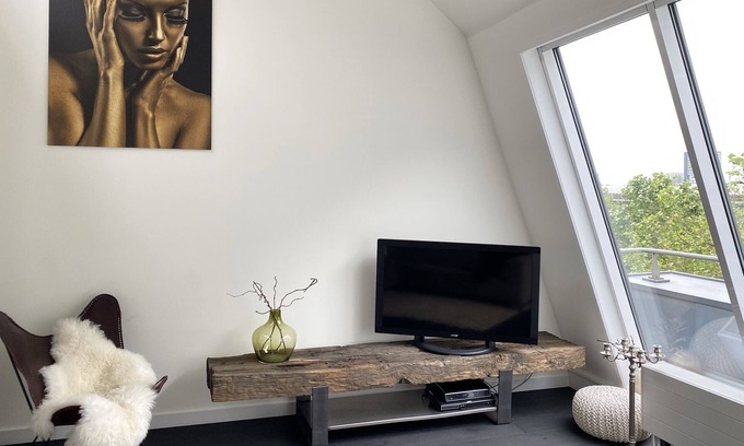 Katendrecht Apartamento | cool city loft with a beautiful view over the Maas