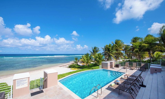 North Side Casa | Coral Kai: Ron Point Villa en Sandy Shores con fabulosas actividades de snorkel en el patio trasero