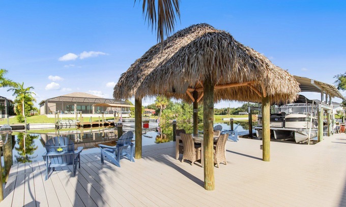 Burnt Store Casa | Coral Paradise - 4/2 Gulf Access Home with Electric Heated Pool, Game Room, Kayaks, Tiki Hut