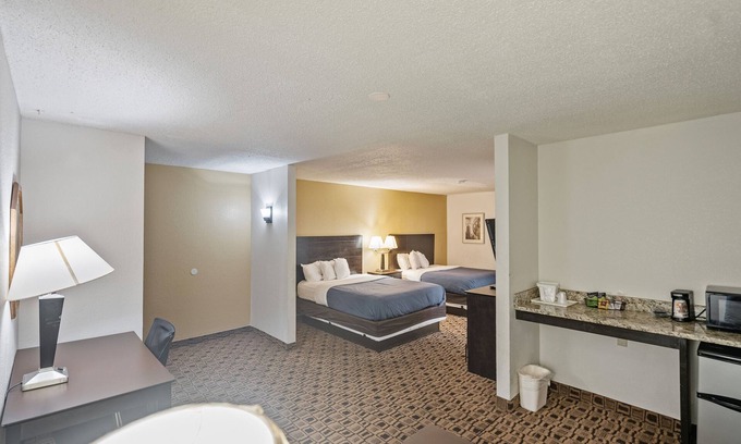 Wichita Hotel | Coratel Plus- Luxury 2 Queen Bed Suite Non-Smoking