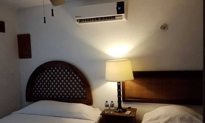 Puerto Juárez Hotel | Corazón de pescador