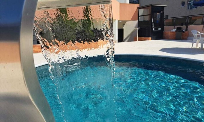 Gonzaga Apartamento | Cosmopolitan Praia Flat