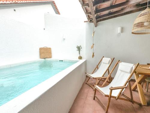 Costa de Caparica Villa | Costa Inn Beach House with Pool by Homeful Homes