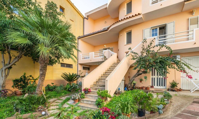 Muravera Apartamento | Hermoso apartamento para 6 personas con A/C, TV, balcón, vista panorámica y aparcamiento