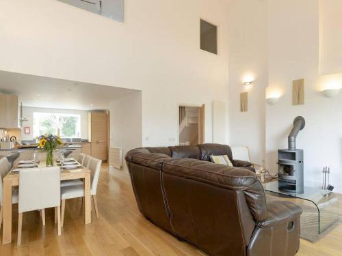 Cirencester Casa | Cotswolds Lake side home with luxury spa Swallows Nest,Lower Mill Estate, Lakeside home and spa with a Harry Potter cupboard under the stairs