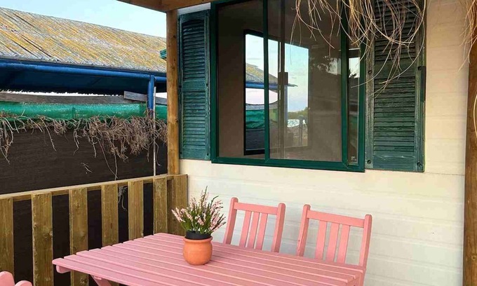 El Palmar Cabaña | Casita de campo 'Coqueta Casita' con terraza privada, Wi-Fi y aire acondicionado