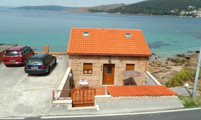 O Pindo Casa | Casita con terraza al lado del mar en O Pindo