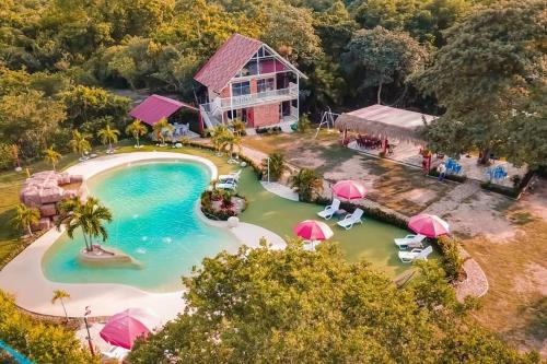Melgar Apartamento | COVEÑITAS Cabaña CARIBE, con piscina tipo playa, capacidad máxima 34 personas
