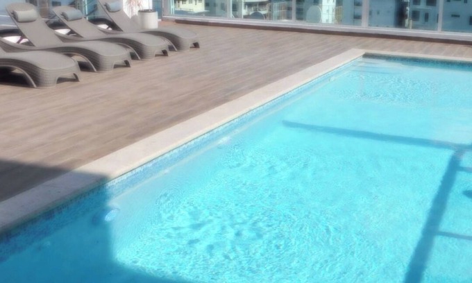 Bella Vista Condominio | Cozy 1-Bedroom Apt in the Heart Bella Vista, Sto Dgo. ROOFTOP, GYM,POOL.PARKING.