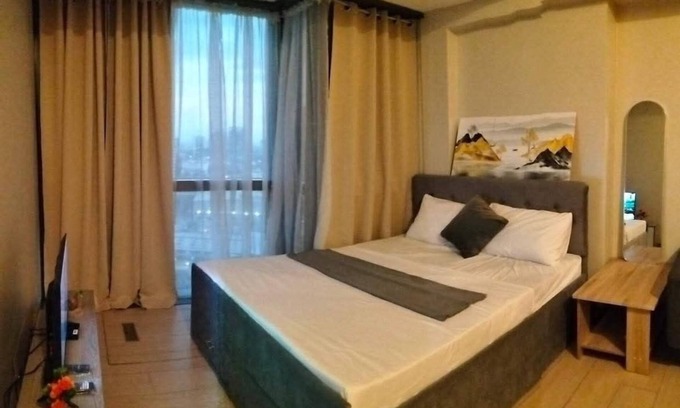 Bagumbayan Condominio | Cozy 1-bedroom condo with WiFi, AC in wonderful Quezon City