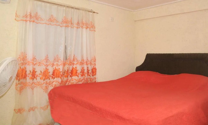 Maynards Casa | Cozy 2 bedroom air conditioned 1 bathroom apartment with swimming pool .